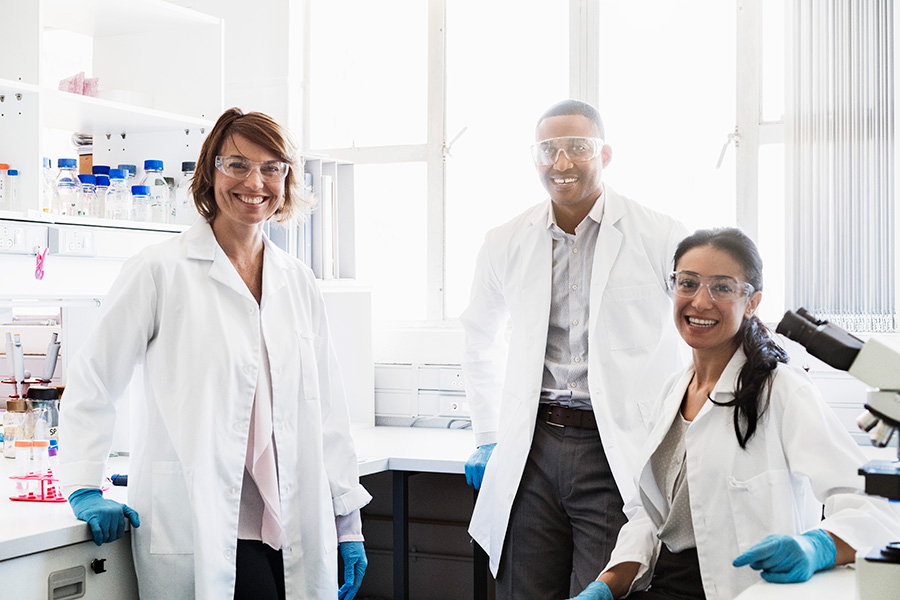 three researchers in a lab