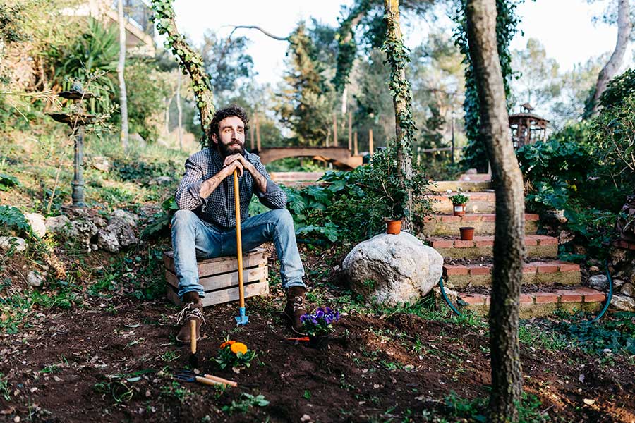 Eligibility man seated in thought outdoors